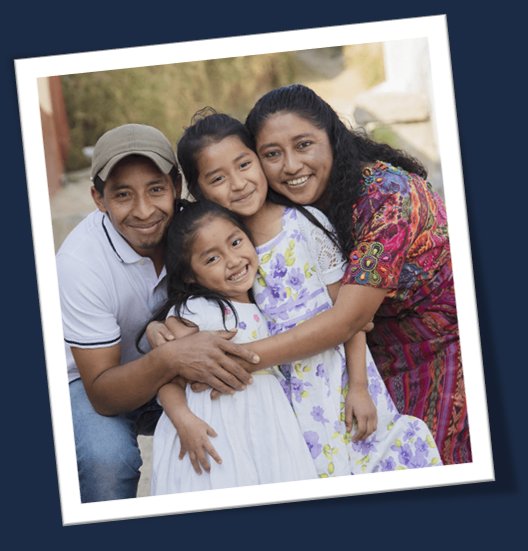 A family embracing outdoors, representing the families Deportee Defense supports